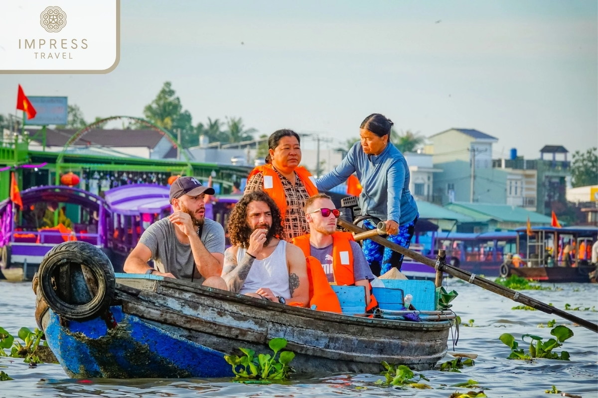 Tourists experience the floating market