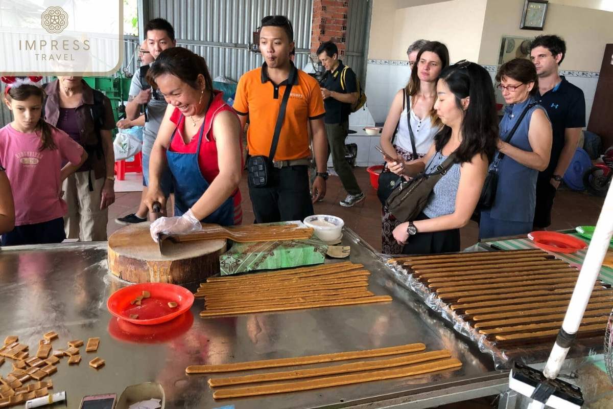 Candy Workshop in My Tho Square at night with a Mekong tour