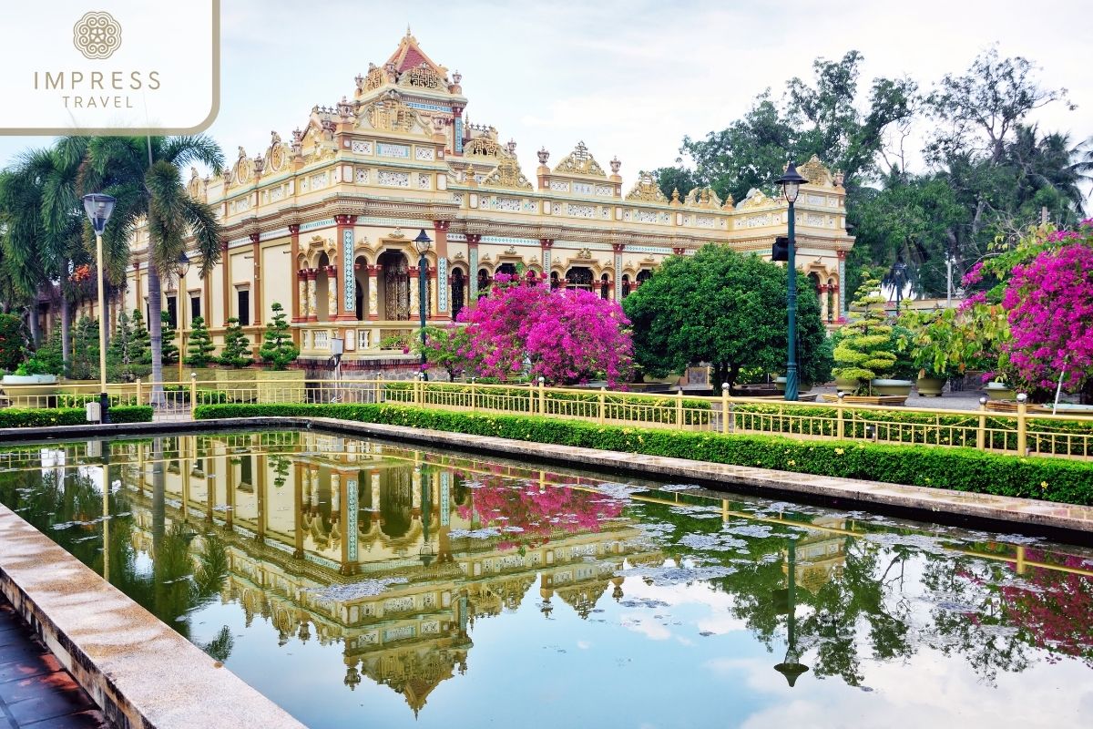 Vinh Trang Pagoda in My Tho Square at night with a Mekong tour