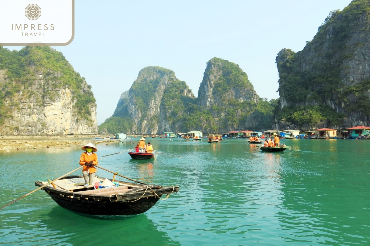 Take a bamboo boat to visit in Visit Halong Bay's Floating Fishing Village 