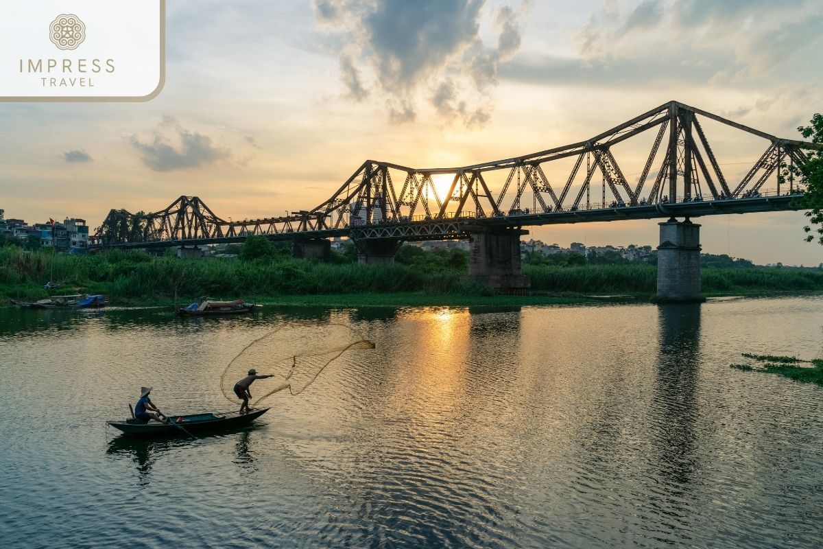 Watch the sunset at Long Bien bridge in Long Bien Bridge Architectural Tour