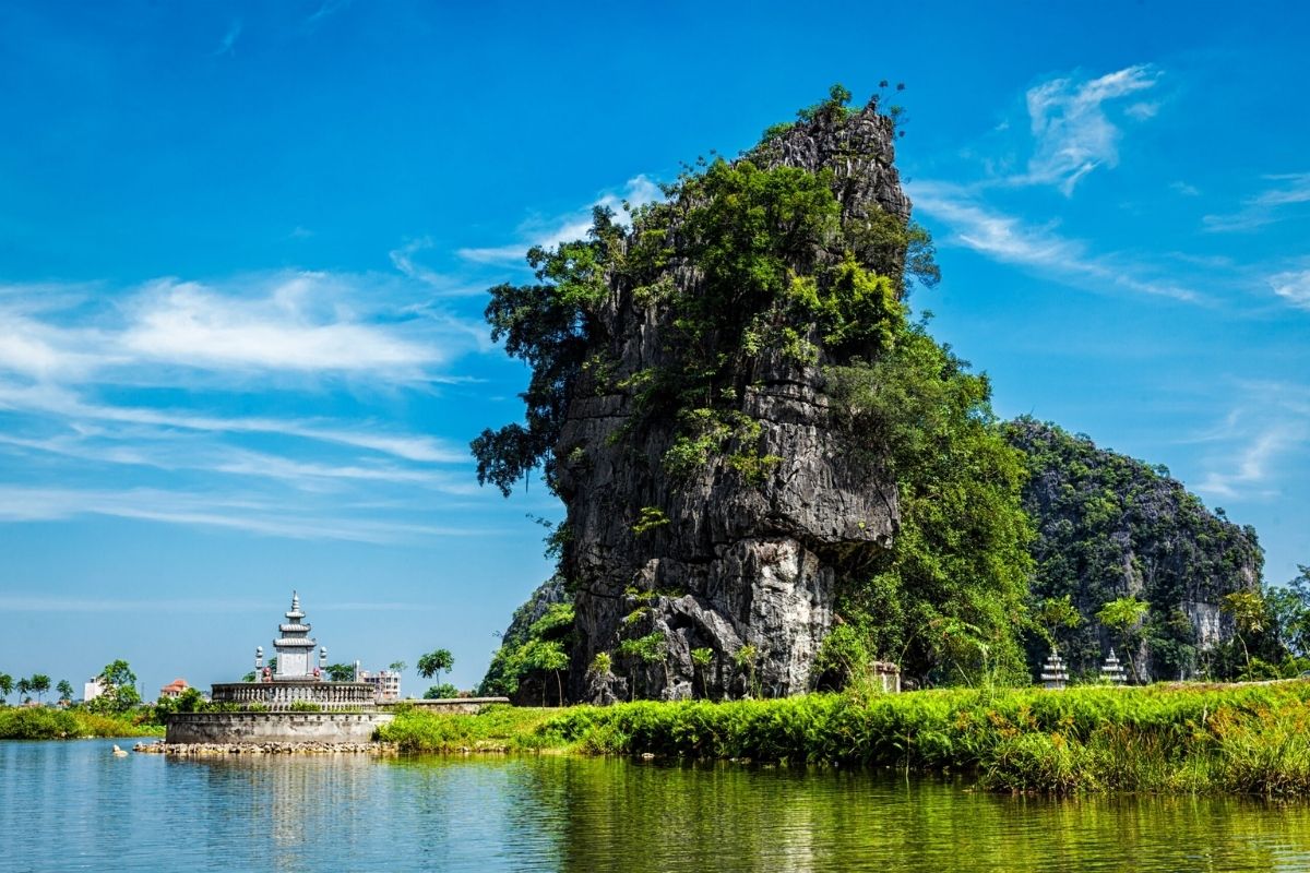 Tam Coc-Bich Dong, featuring serene rivers, limestone caves, and rich cultural heritage