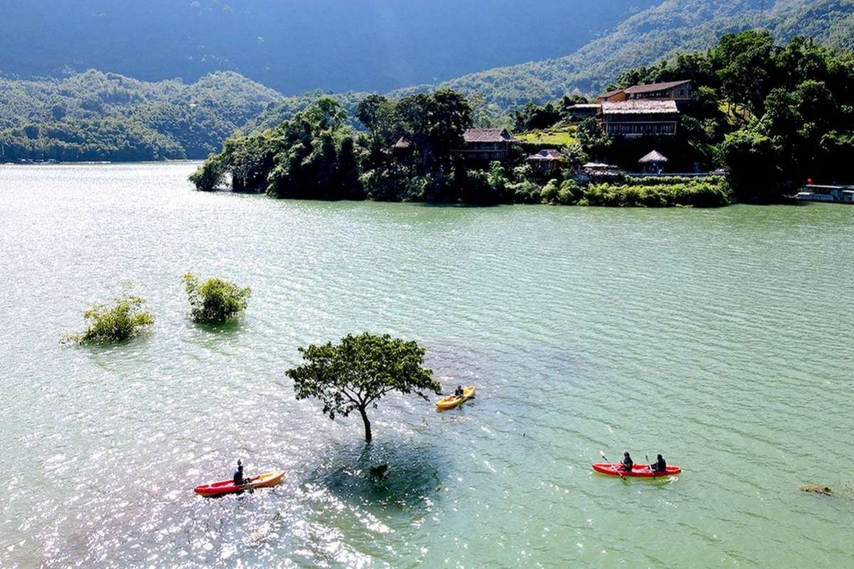 a 2-day adventure of kayaking, cycling, and cultural immersion in Vietnam’s stunning northwest