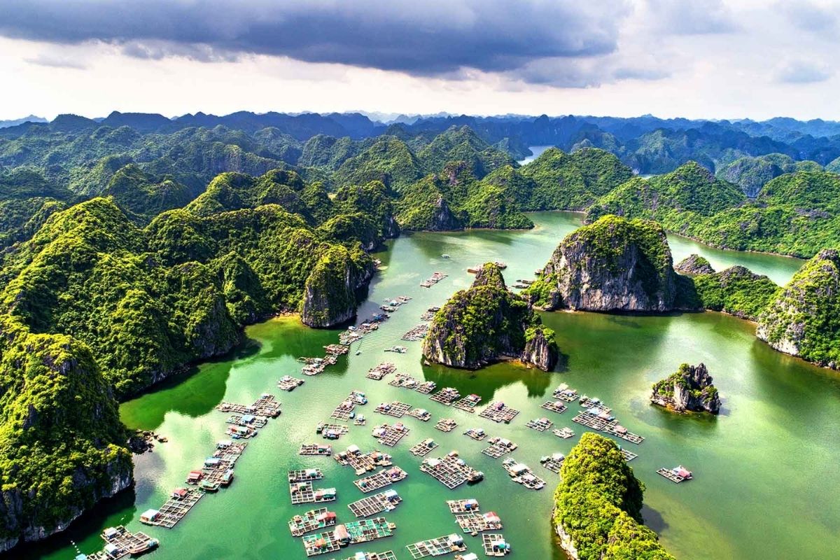 Halong Bay is famous for its dramatic limestone karsts, emerald waters, and concealed caves.