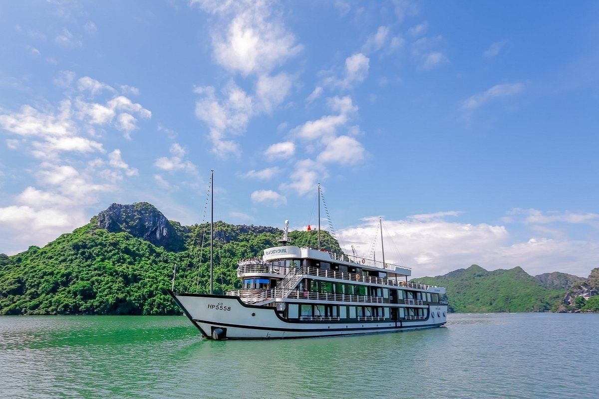 featuring 5-star cabins, kayaking, squid fishing, and stunning Halong Bay views