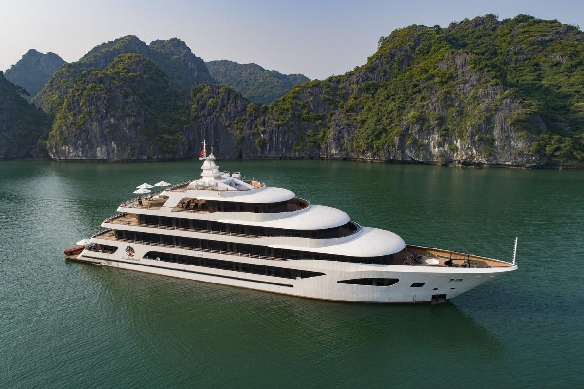 a luxurious, eco-friendly journey through Halong Bay and Lan Ha Bay, blending sustainability and adventure. 