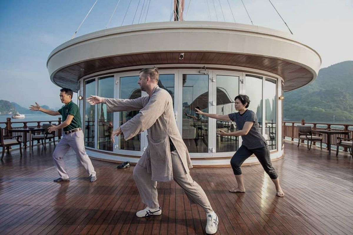 Tai Chi Class on the Sundeck with Halong Tours Stay at Heritage Line Ylang Cruise