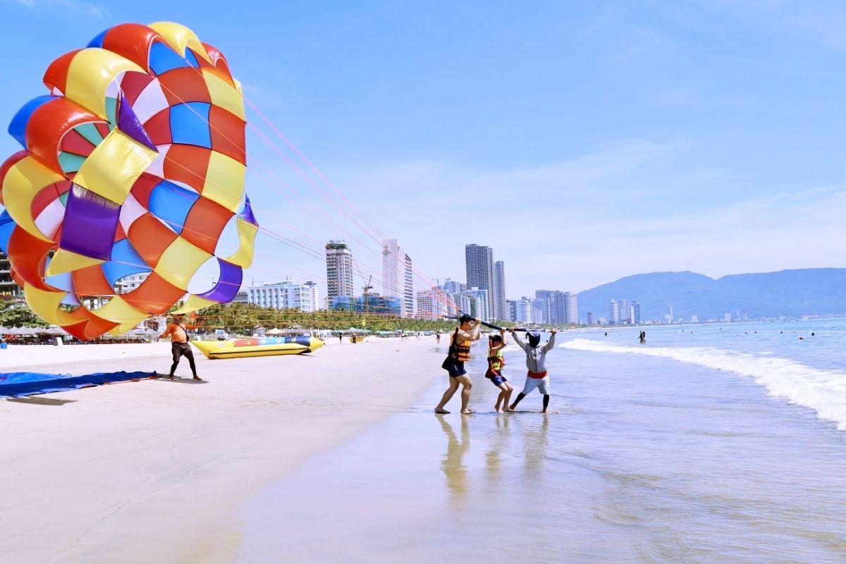 Experience the thrill of Parasailing in Danang in Non Nuoc Beach