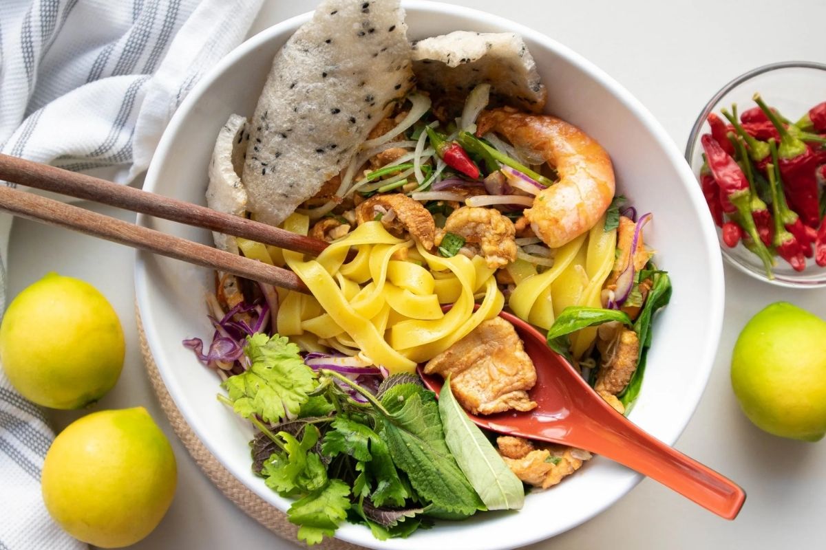  Discover the Culinary Delights for Danang Tours & local specialties with Mi Quang