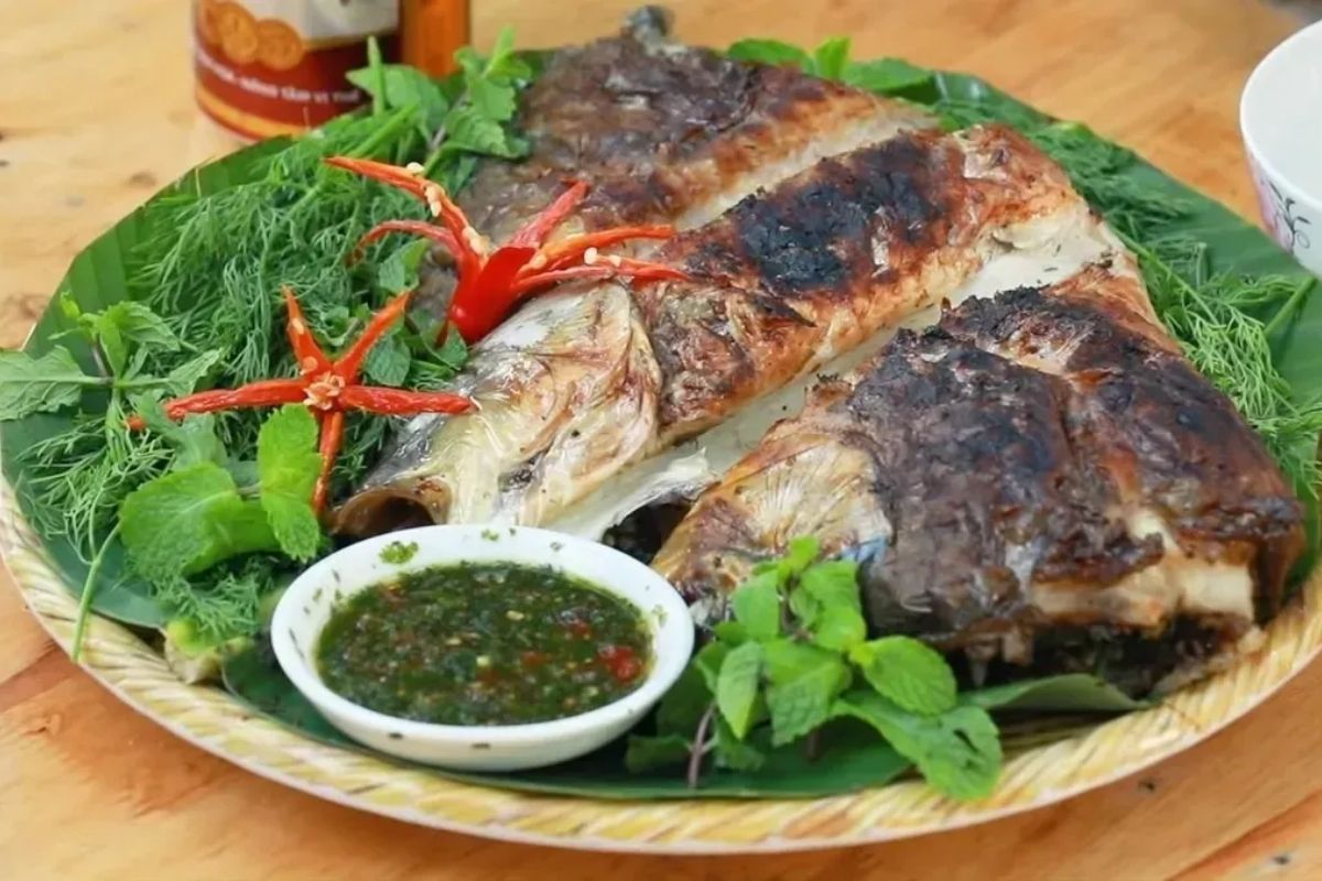Fish grilled in herbs and mac khen