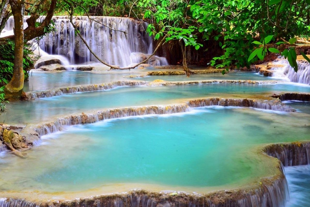 Enjoy Kuang Si Falls with Laos vs Vietnam travel