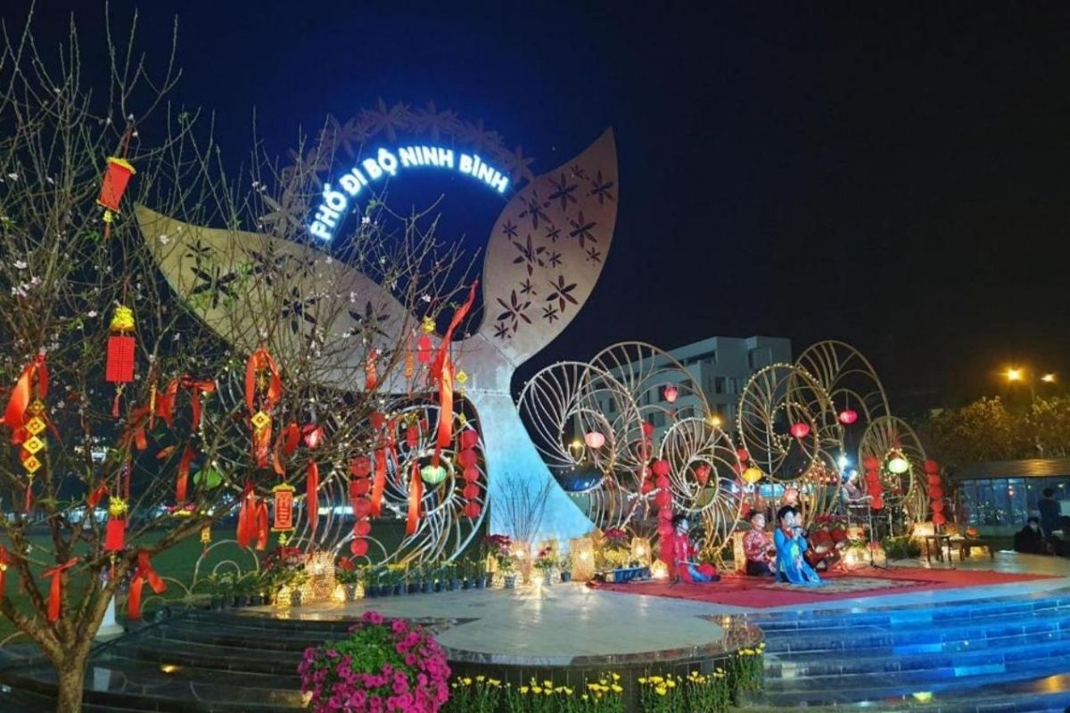 Discover the vibrant charm of Ninh Binh Walking Street with The Whale Tail Icon