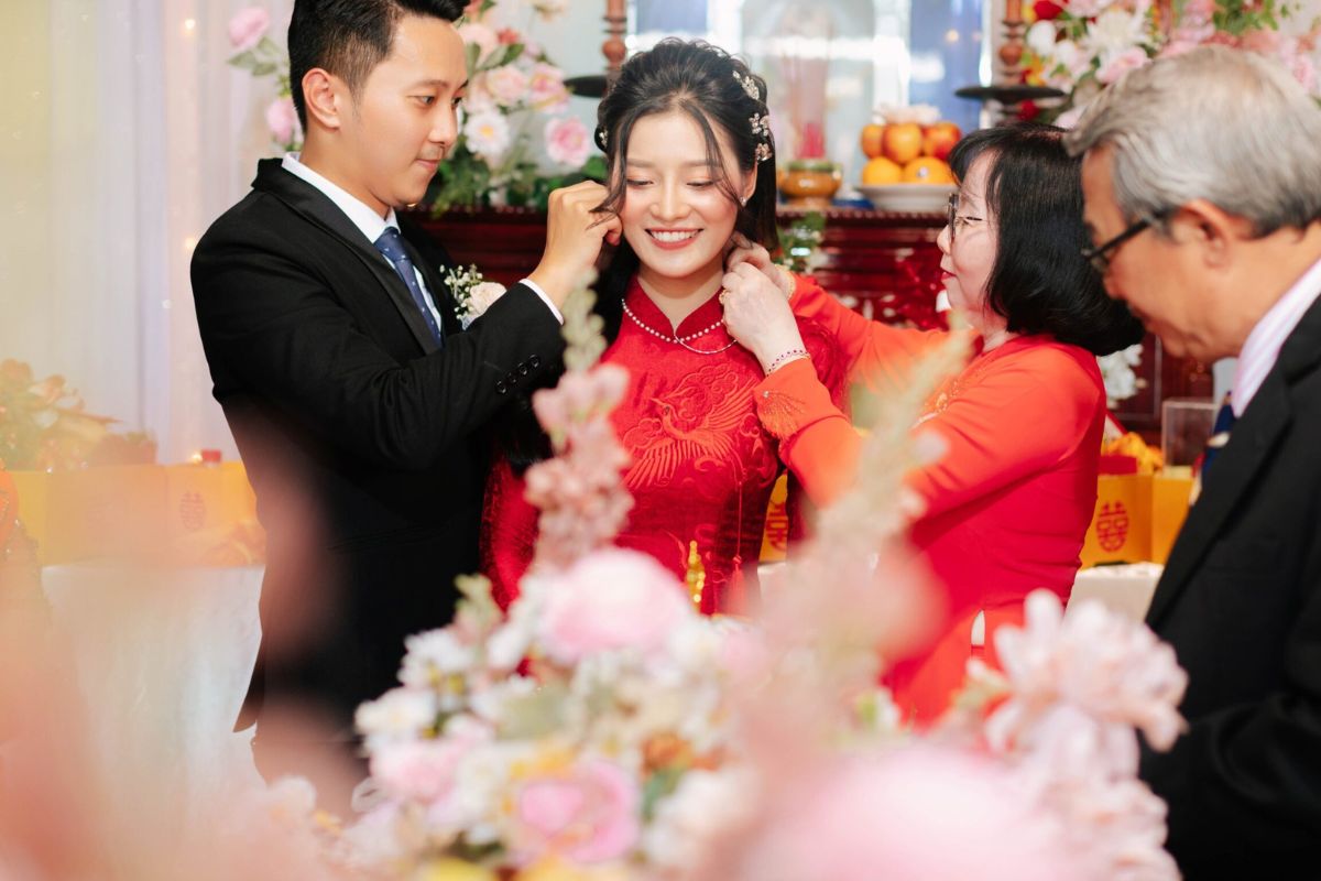 Northern Bride Wears Red Ao Dai