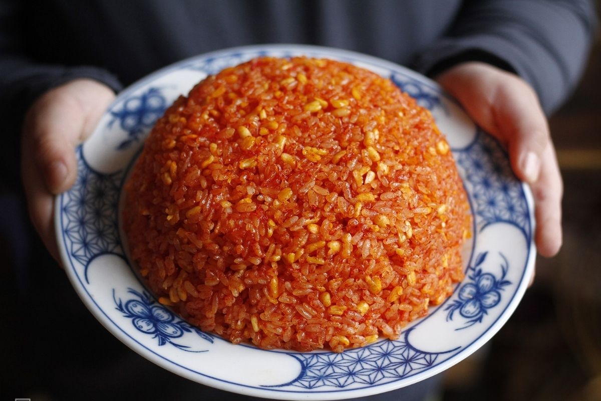 Enjoy the taste of Xoi Gac with Sticky Rice Hanoi
