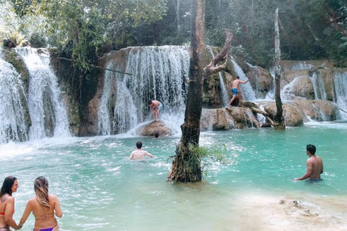 Swimming in the Natural Pools at Tad Sae Laos Waterfall