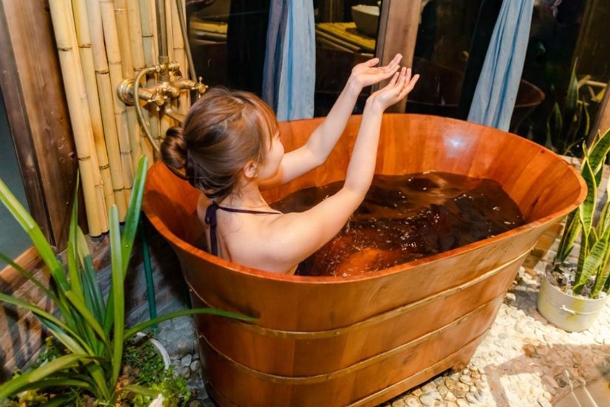 Relax with a Red Dao herbal bath — a perfect end to your Sapa Vietnam DIY itinerary